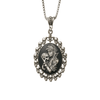 Antiqued White Voodoo Mistress Holding a Sugar Skull Cameo in Skull Frame Pendant